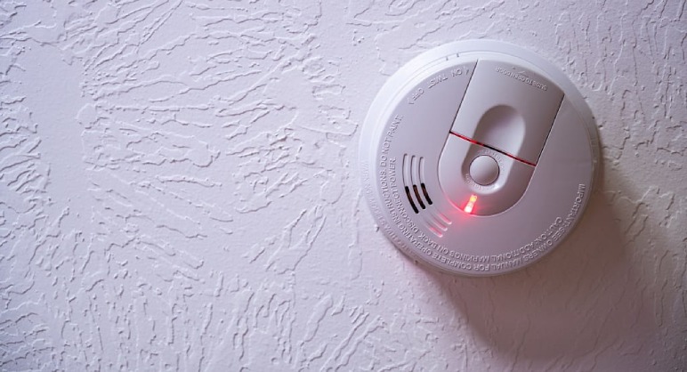 how to stop smoke detector from beeping